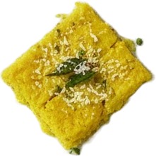 a square piece of food with a green leaf on top.jpg